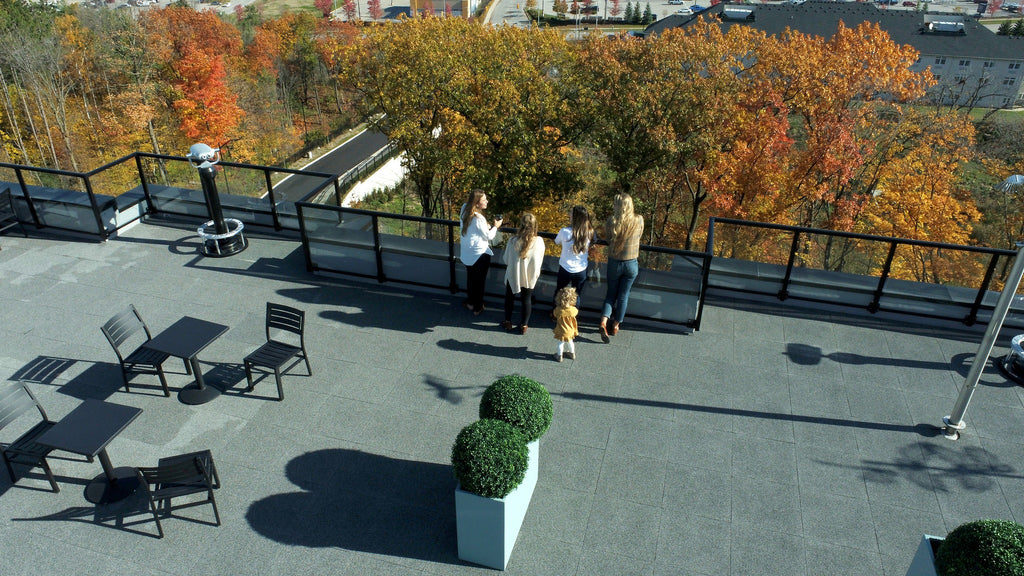 Creating a Communal Living Space on top of an Apartment Block Using Grey Rooftop Rubber Flooring