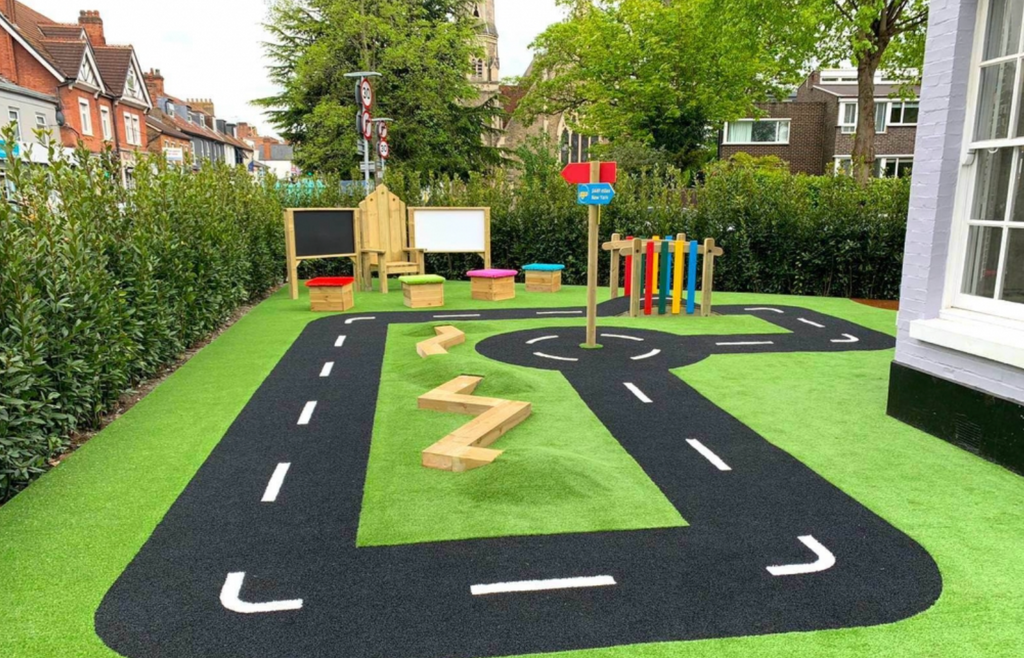 Creating bespoke play scenes using outdoor play grass