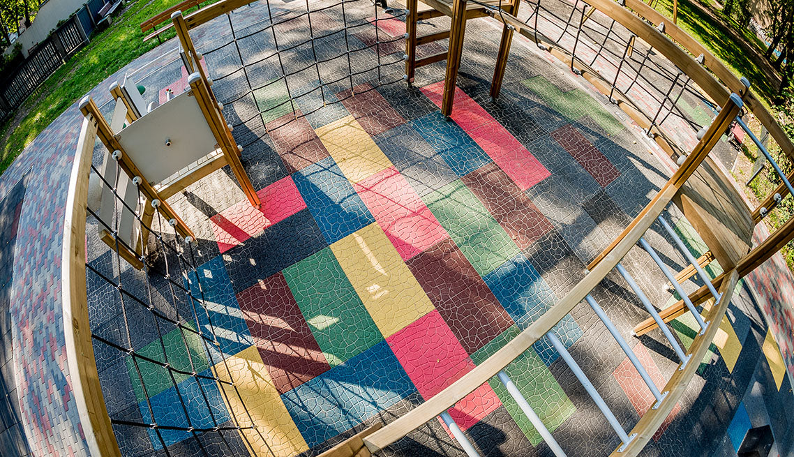 Rubber Coloured Playground Tiles with Cracked Earth Design