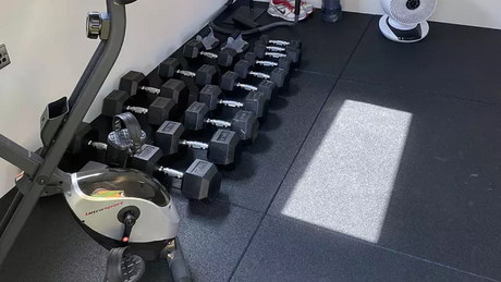 Image of 20mm pro flooring with dumbbells on the floor
