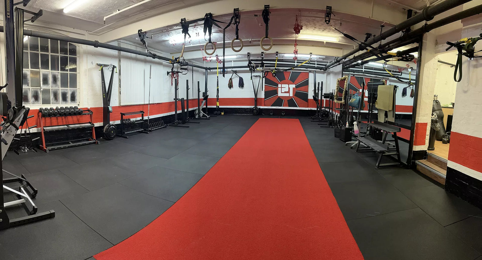 Customer Spotlight: Matt S Creates a High-Performance PT Studio with 20mm PRO Tiles & Red Uni Sled Track