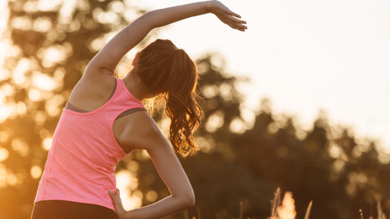 Woman stretching outside